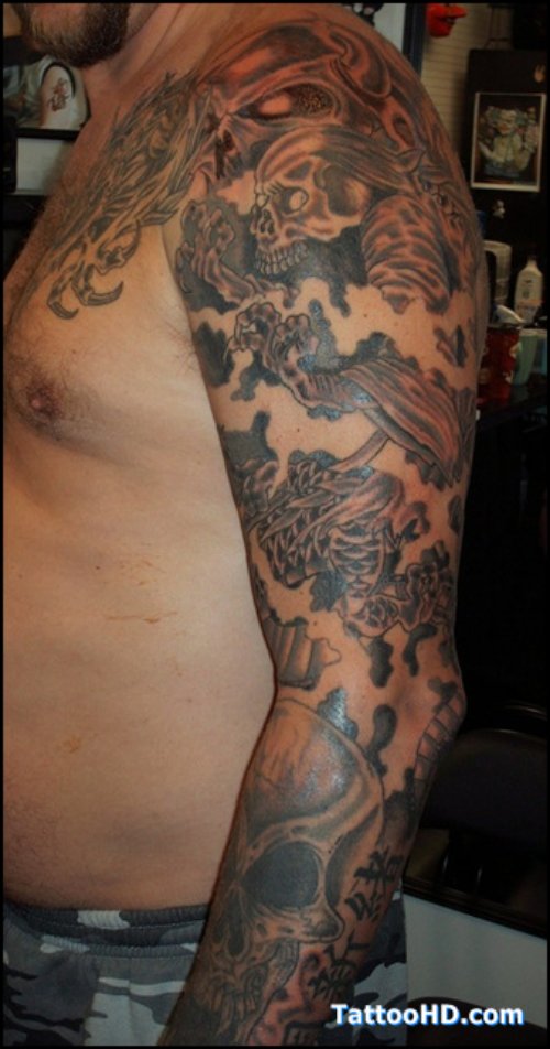 Amazing Asian Tattoo On Man Left Sleeve