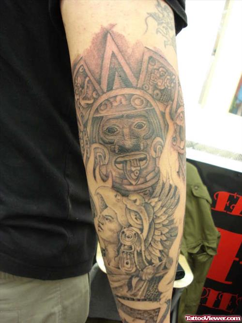 Grey Ink Aztec Tattoo On Right Sleeve