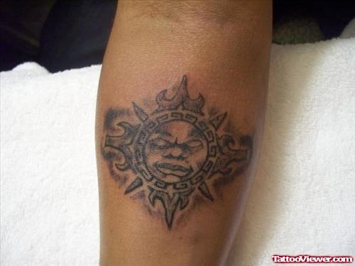 Grey Ink Aztec Sun Tattoo On Arm