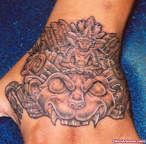 Grey Ink Aztec Tattoo On Hand