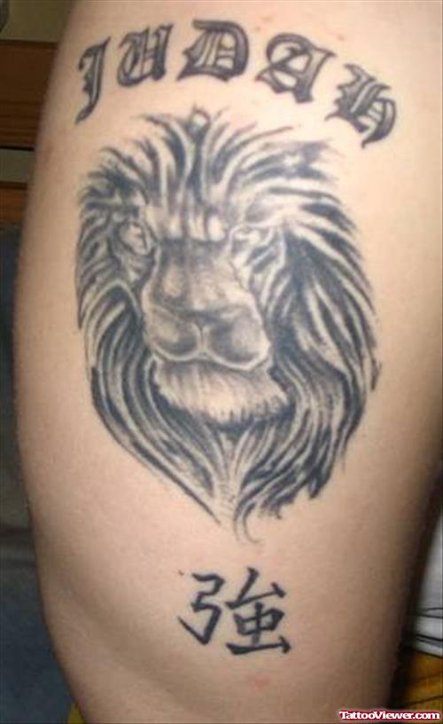 Grey Ink Aztec Lion Head Tattoo