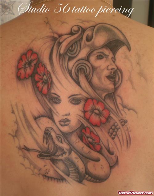 Red Flowers And Aztec Tattoo On Back