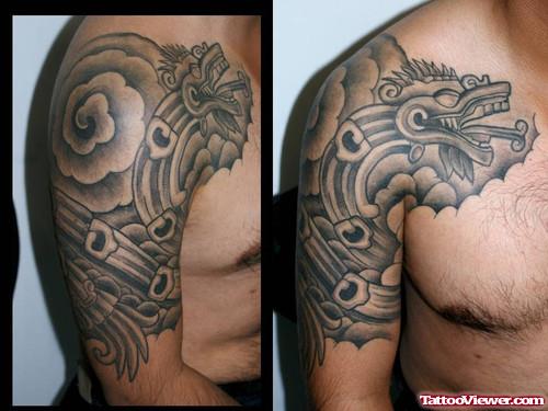 Grey Ink Aztec Tattoo On Man Right Shoulder