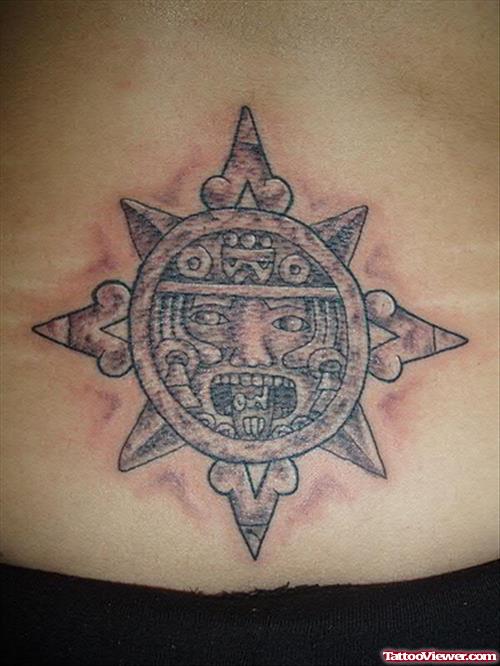Cool Grey Ink Aztec Sun Tattoo On Lowerback