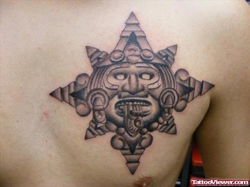 Grey Ink Aztec Stat Tattoo On Chest