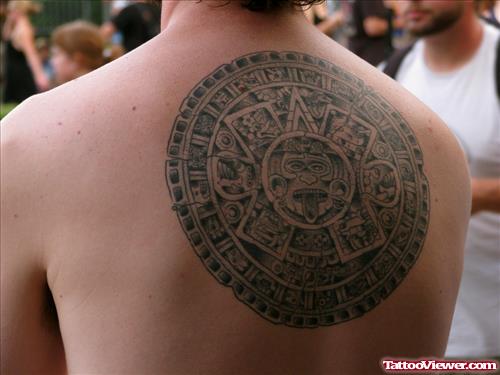 Grey Ink Aztec Tattoo On Man Upperback