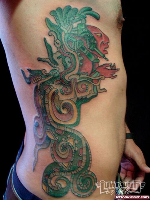 Aztec Colored Tattoo On Side Rib