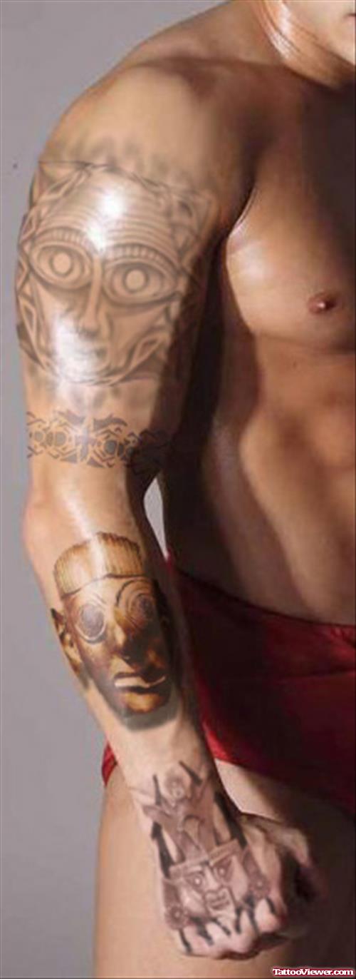 Grey Ink Aztec Tattoo On Man Right Sleeve