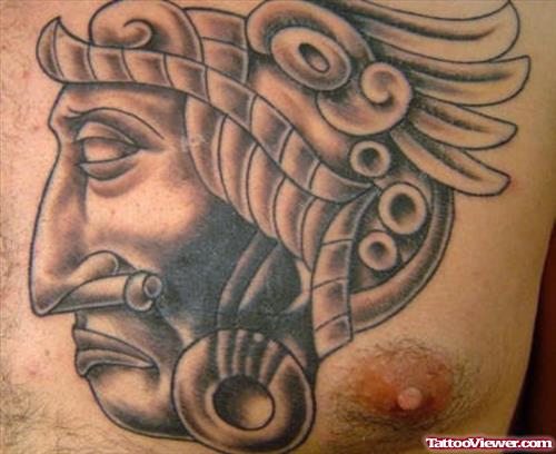 Aztec Head Tattoo On Chest