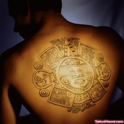 Aztec Face Tattoo On Man Back