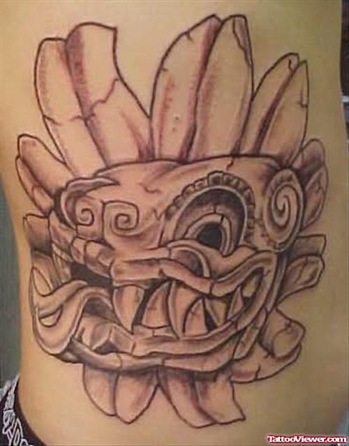 Aztec Sharm Teeth Tattoo