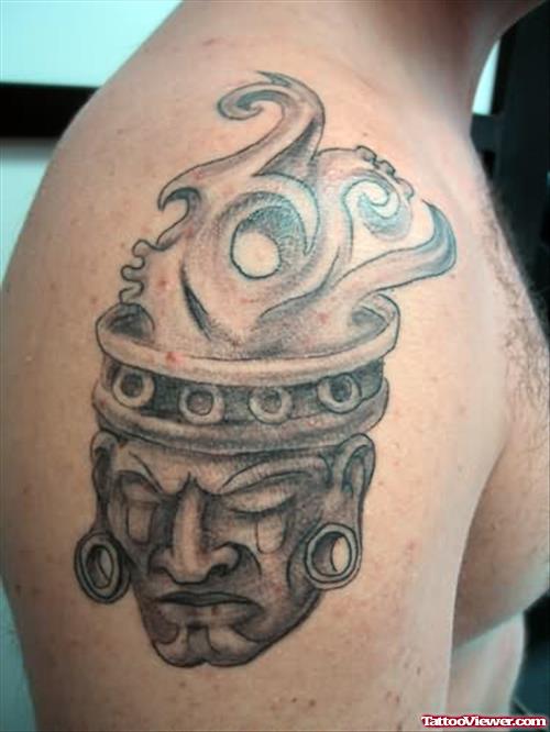 Aztec Mask Tattoo On Bicep