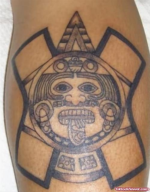 Aztec Tongue Tattoo On Muscles