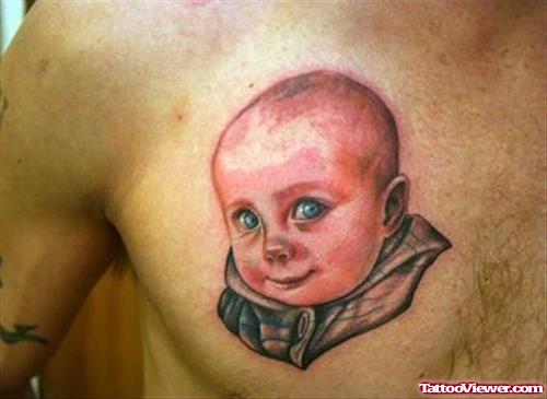 Ugly Baby Tattoo On Man Chest