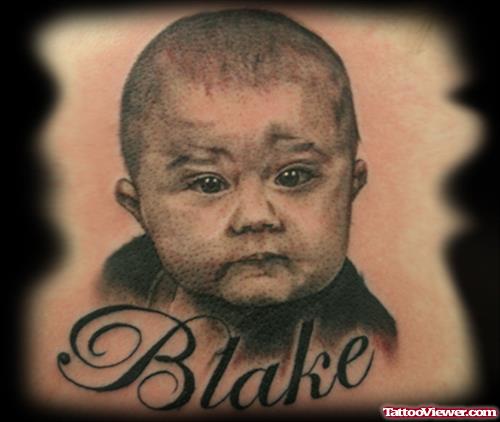 Grey Ink Blake Baby Head Tattoo