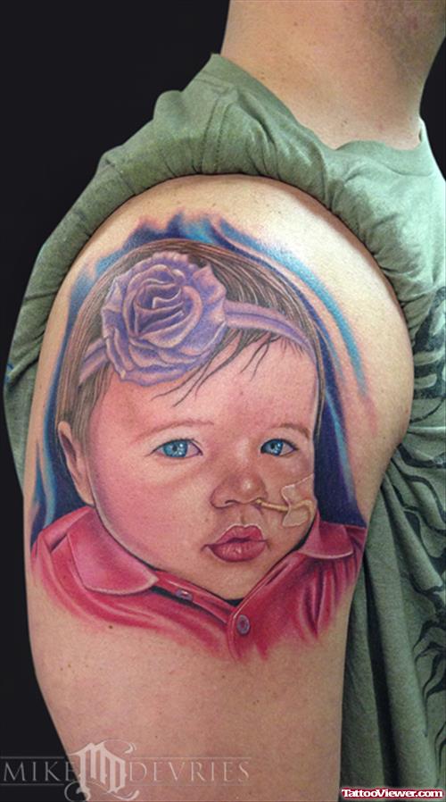 Colored Baby Portrait Tattoo On Right Shoulder