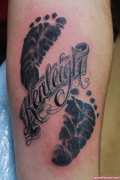 Name Banner And Baby Footprints Tattoos