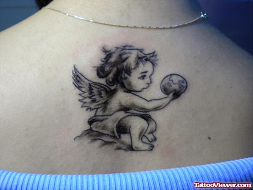 Beautiful Grey Ink Baby Angel Tattoo On Upperback