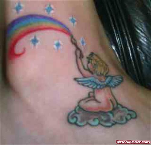 Baby Angel With Rainbow Tattoo On Foot