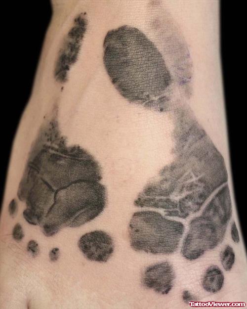 Grey Ink Baby Feet Tattoos