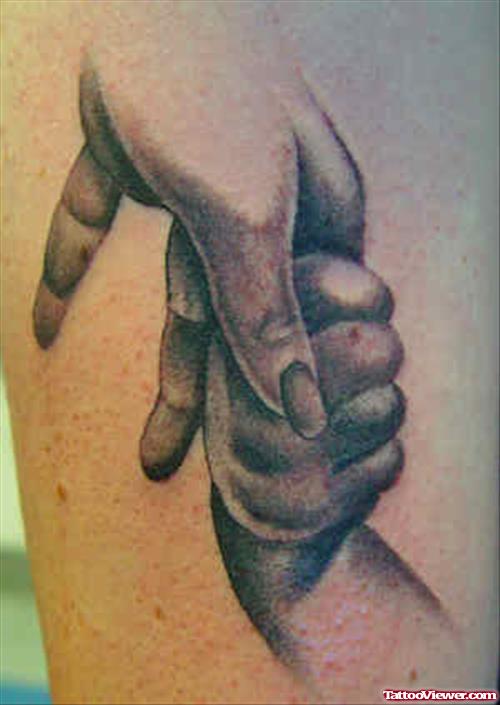 Grey Ink Baby Hands Tattoo
