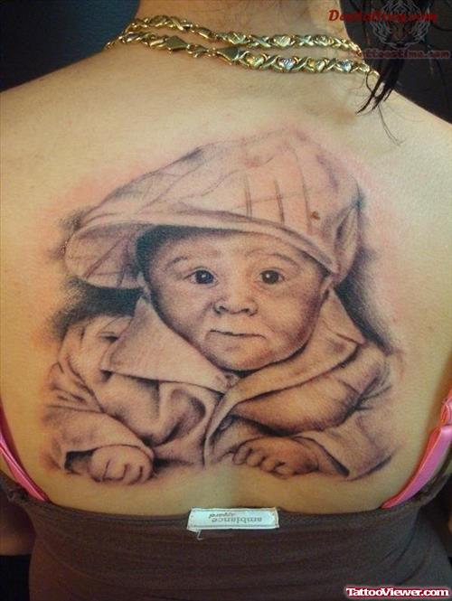 Awesome Grey Ink Baby Tattoo On Back