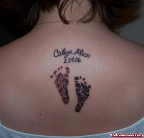 Memorial Baby Footprints Tattoo On Upperback