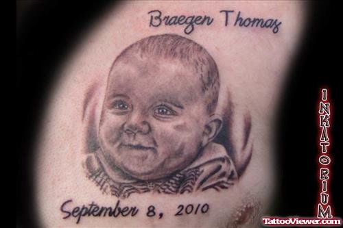 Grey Ink Memorial Baby Portrait Tattoo Design