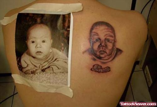Awesome Grey Ink Baby Portrait Tattoo On Right Back Shoulder