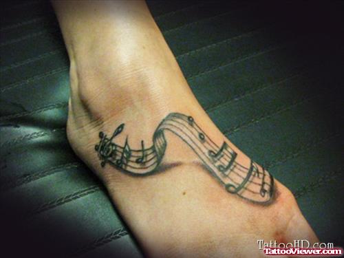 Music Notes Tattoo On Right Foot