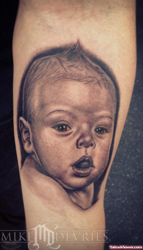 Grey Ink Baby Portrait Tattoo On Right Sleeve