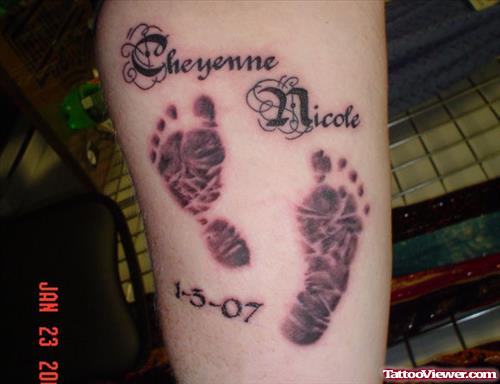 Amazing Baby Footprints Memorial Tattoo On Arm