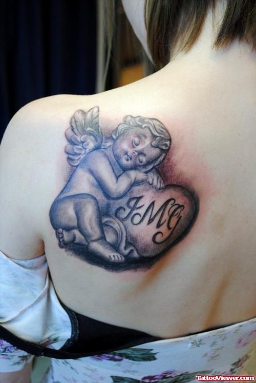 Grey Ink Baby Angel With Heart Tattoo On Back Shoulder