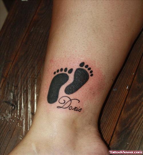 Baby Name And Footprints Tattoo On Ankle