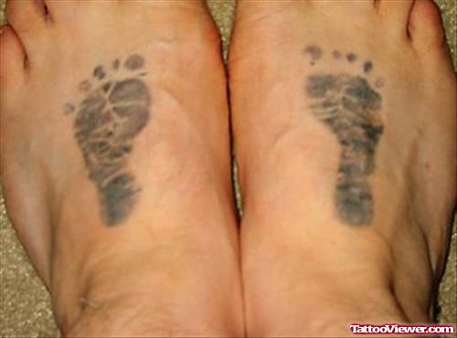 Baby Footprints Tattoo On Right Foot
