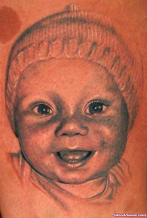 Cute Smiling Baby Tattoo