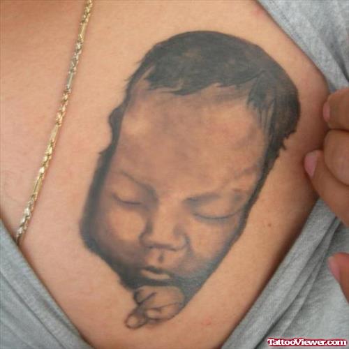 Awesome Grey Ink Sleeping Baby Tattoo
