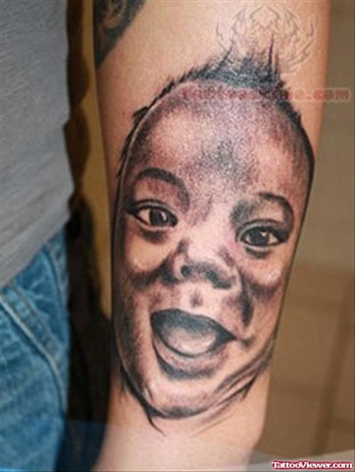 Amazing Baby Face Tattoo
