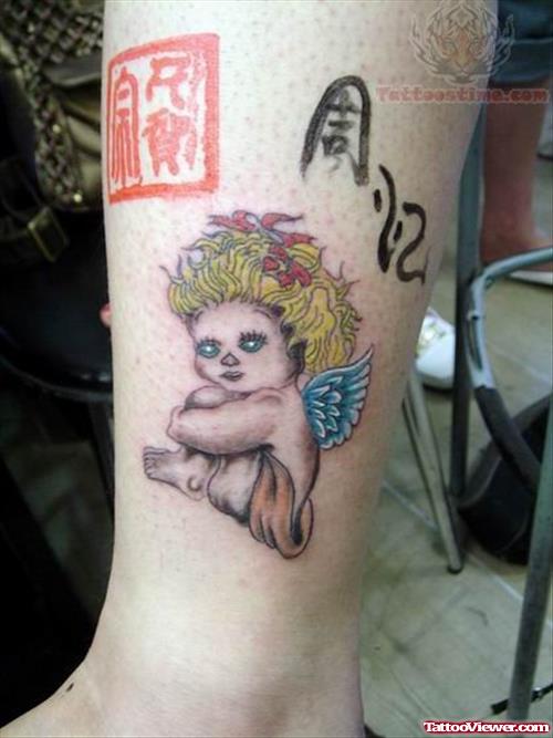 Baby Angel Tattoo On Leg
