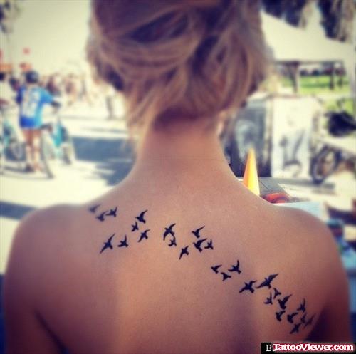 Black Ink Flying Birds Back Tattoo For Girls