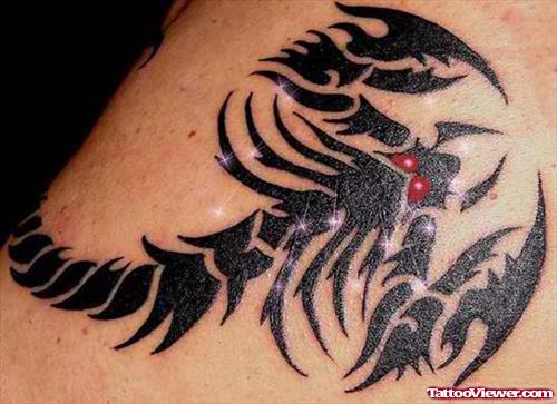 Tribal Scorpion Red Eyes Back Tattoo