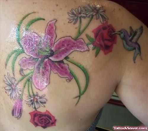 Rose And Lily Flowers With Hummingbird Back Tattoo