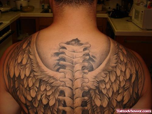 Large Angel Wings Grey Ink Tattoo On Upperback