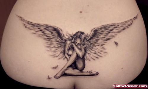 Grey Ink Fallen Angel Tattoo On Lowerback