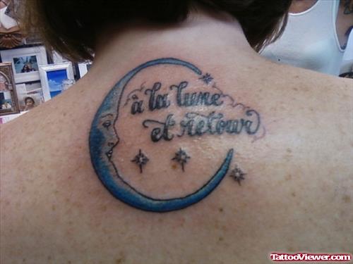 Blue Ink Moon And Lettering Back Tattoo For Girls