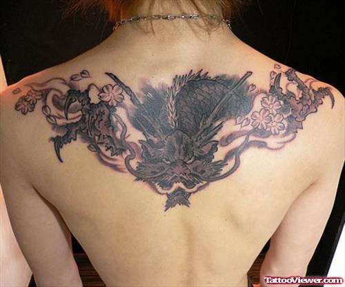 Grey Ink Dragon Head Back Tattoo