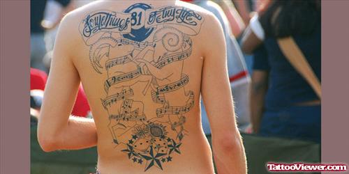 Music Notes And Nautical Stars Back Tattoo