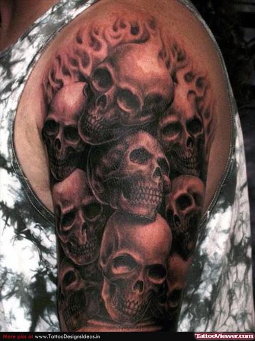 Grey Ink Skulls Back Tattoo