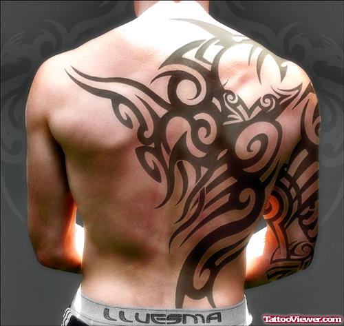 Amazing Tribal Back Tattoo