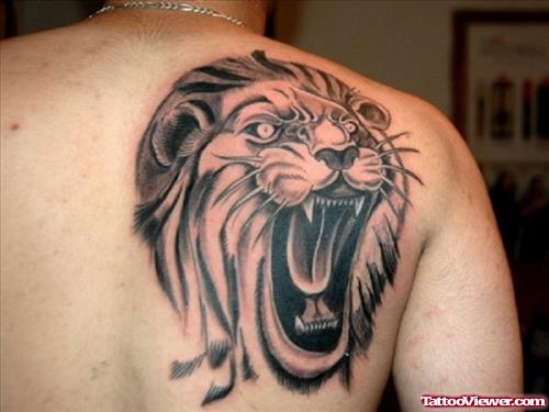 Roaring Lion Head Back Tattoo